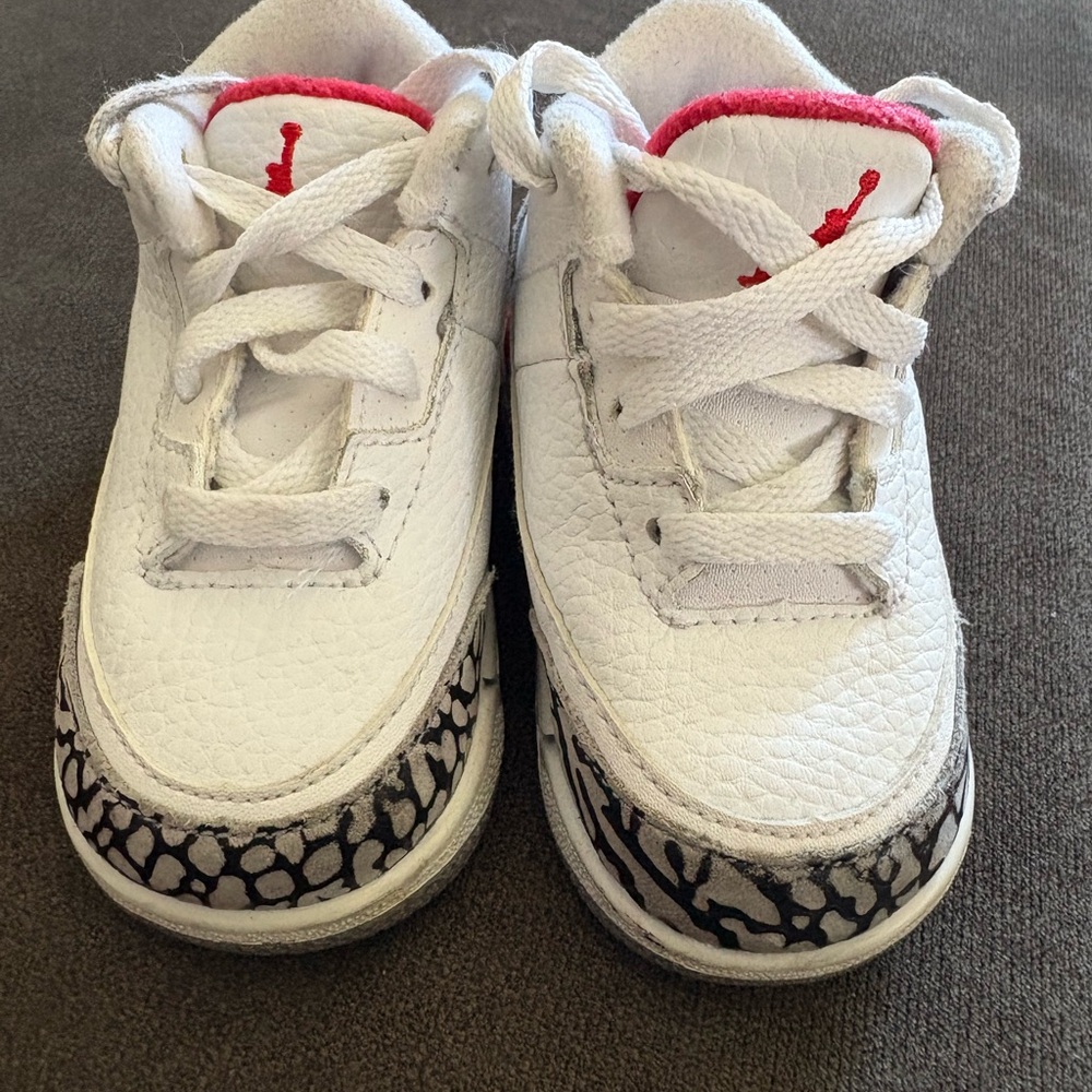 Jordan White and Red Sneakers with Iconic Design